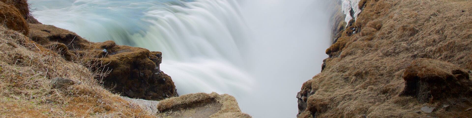 Gullfoss Waterfall which includes a gorge or canyon, landscape views and a waterfall