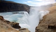Gullfoss Waterfall which includes a gorge or canyon, landscape views and a waterfall