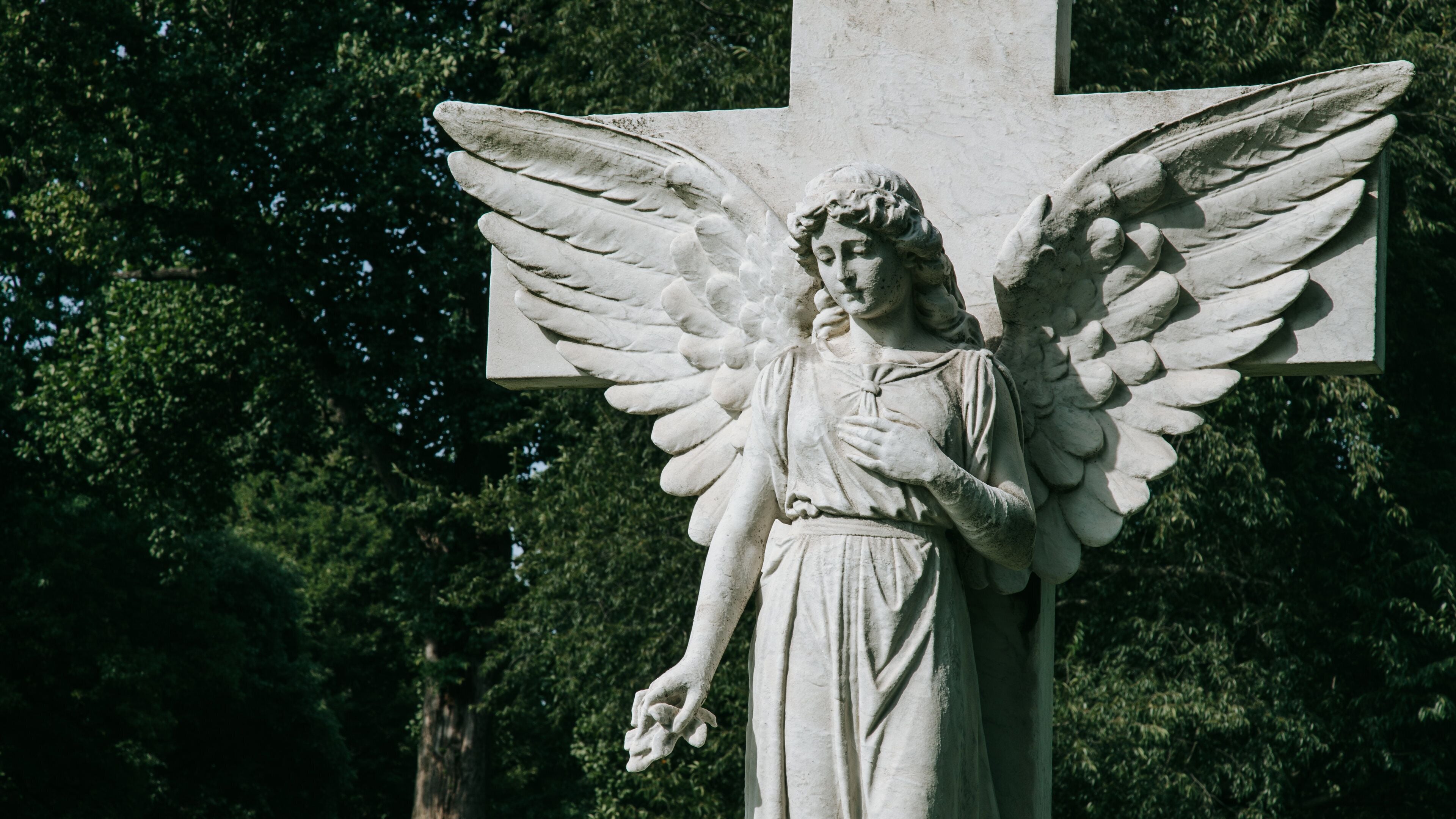 Crown Hill Cemetery which includes a statue or sculpture