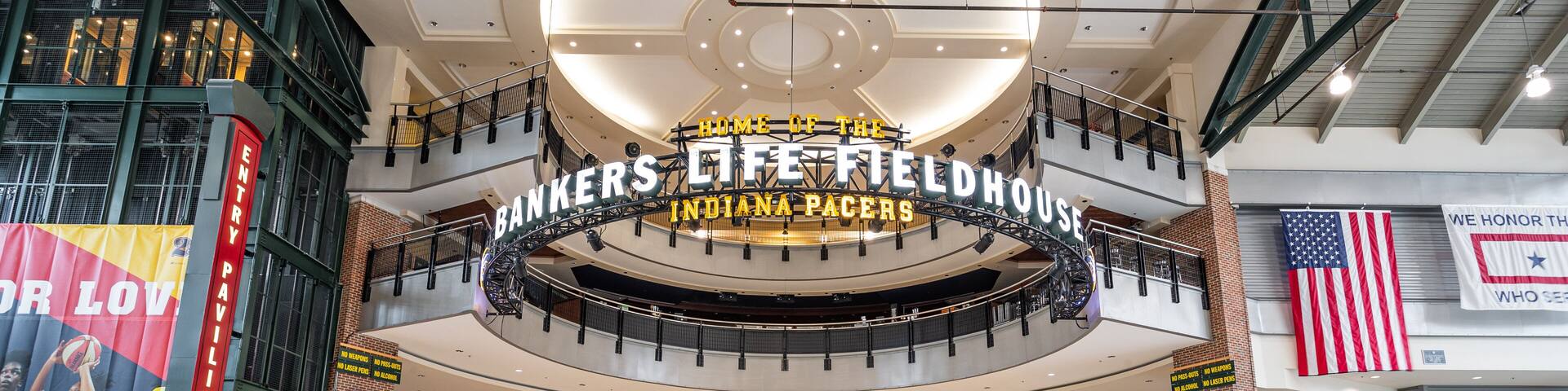 Bankers Life Fieldhouse which includes signage and interior views