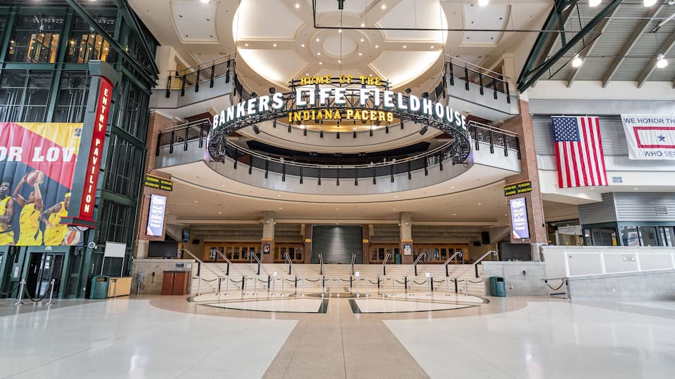 Bankers Life Fieldhouse which includes signage and interior views