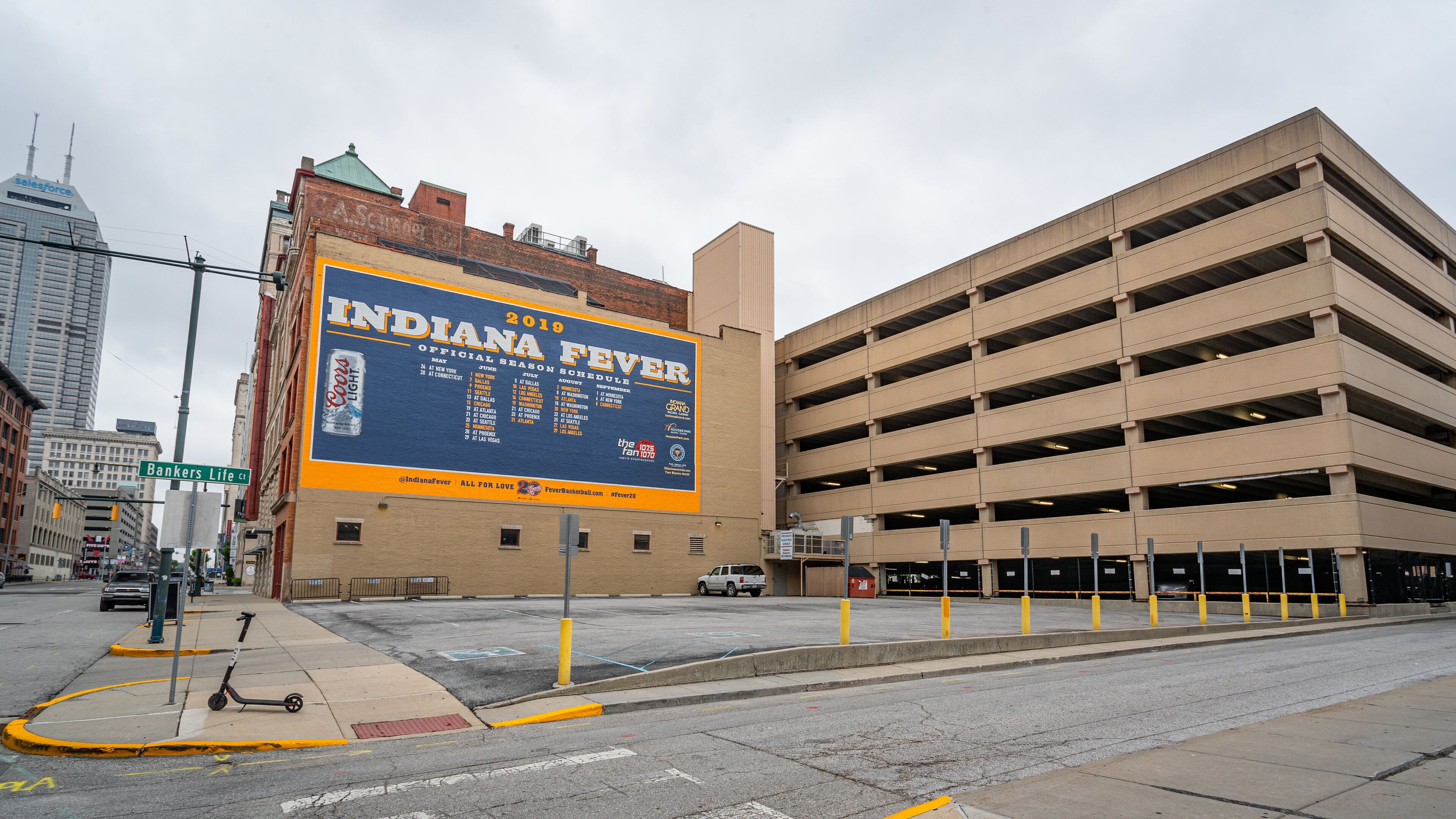 Bankers Life Fieldhouse showing signage and a city