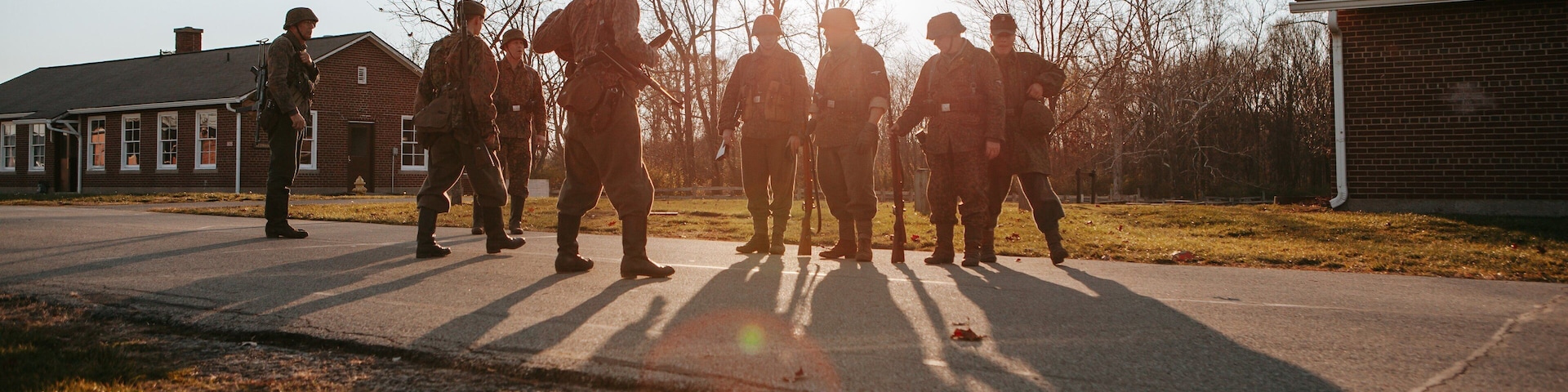 Fort Harrison State Park featuring military items and a sunset as well as a small group of people