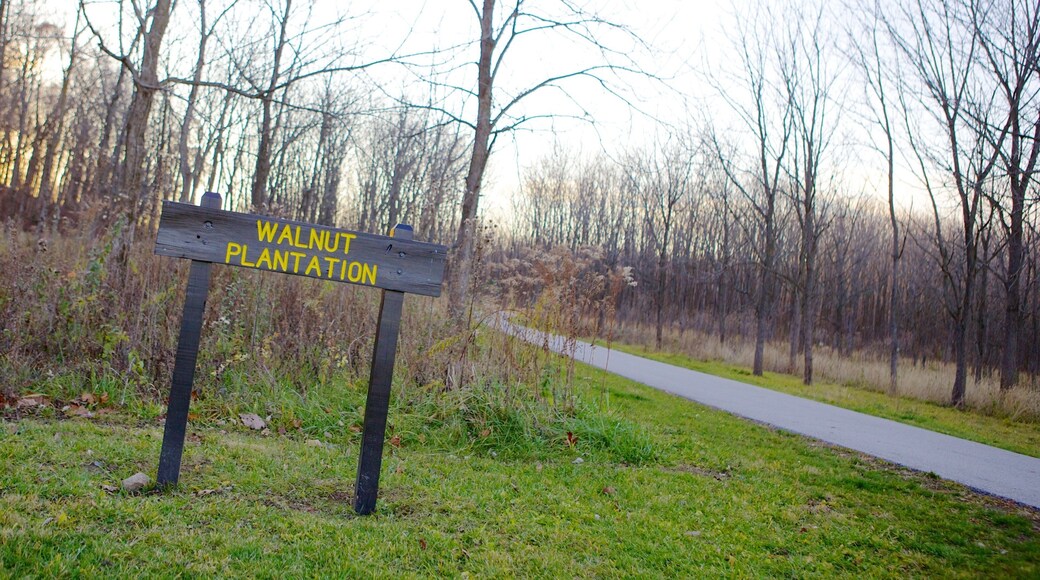 Fort Harrison State Park featuring signage, landscape views and a garden