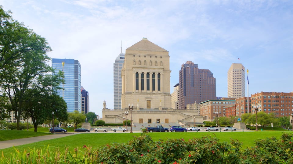 Downtown Indianapolis showing heritage architecture, a park and a city