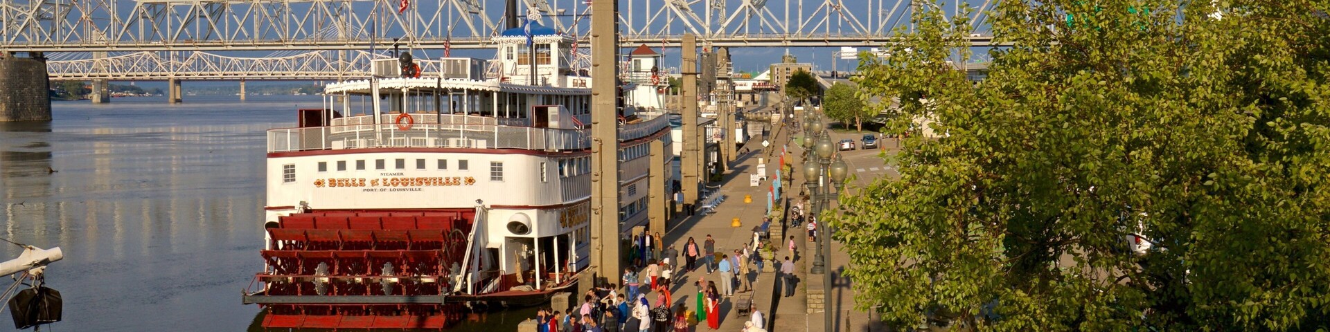 Belle of Louisville showing a bridge, a ferry and a bay or harbor