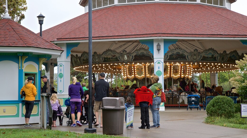 Louisville Zoo which includes rides as well as a small group of people