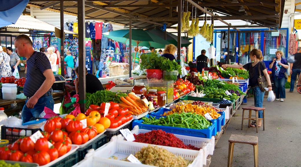 Riga Central Market which includes markets and street scenes as well as a large group of people