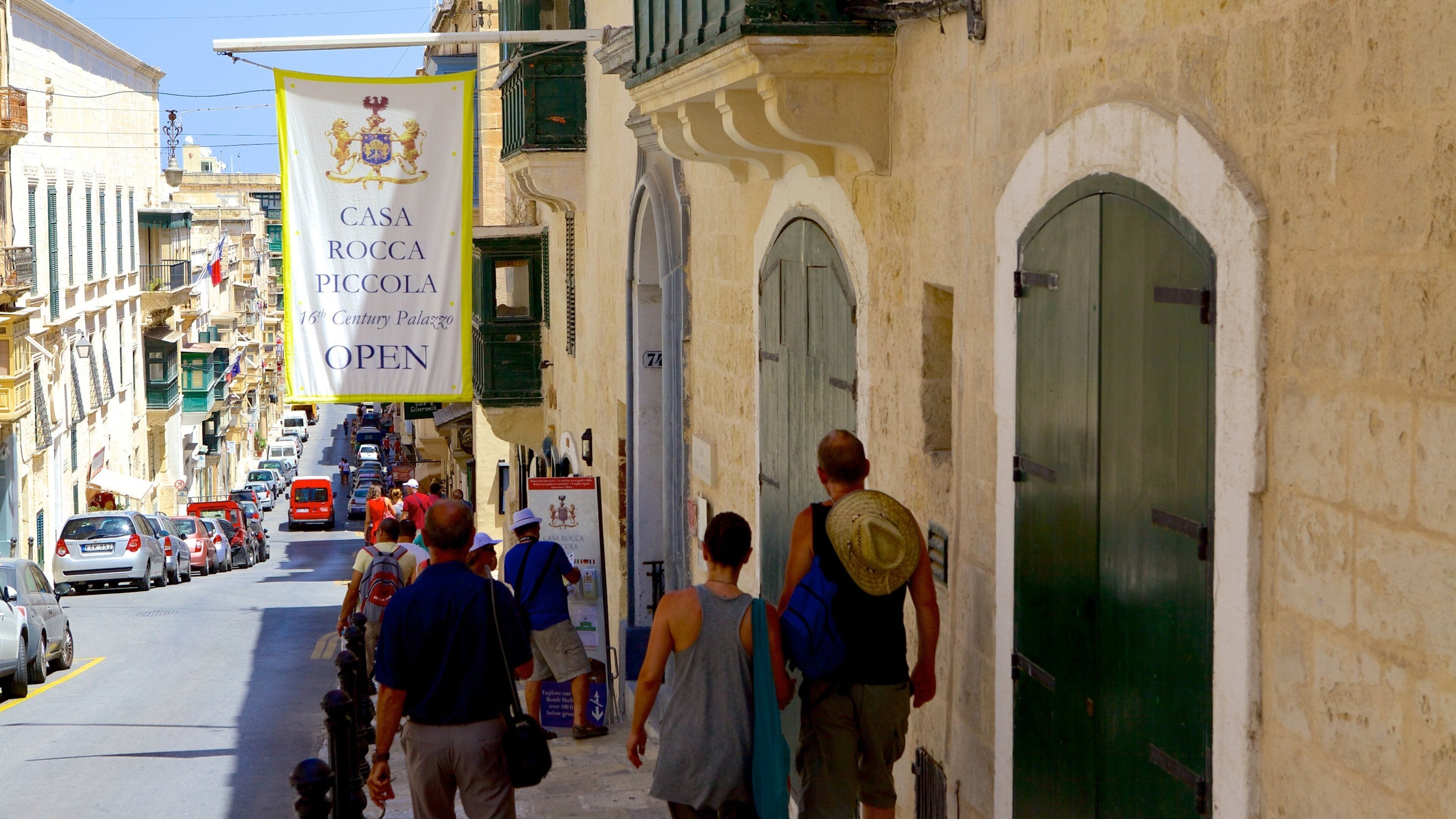 Casa Rocca Piccola featuring street scenes and signage