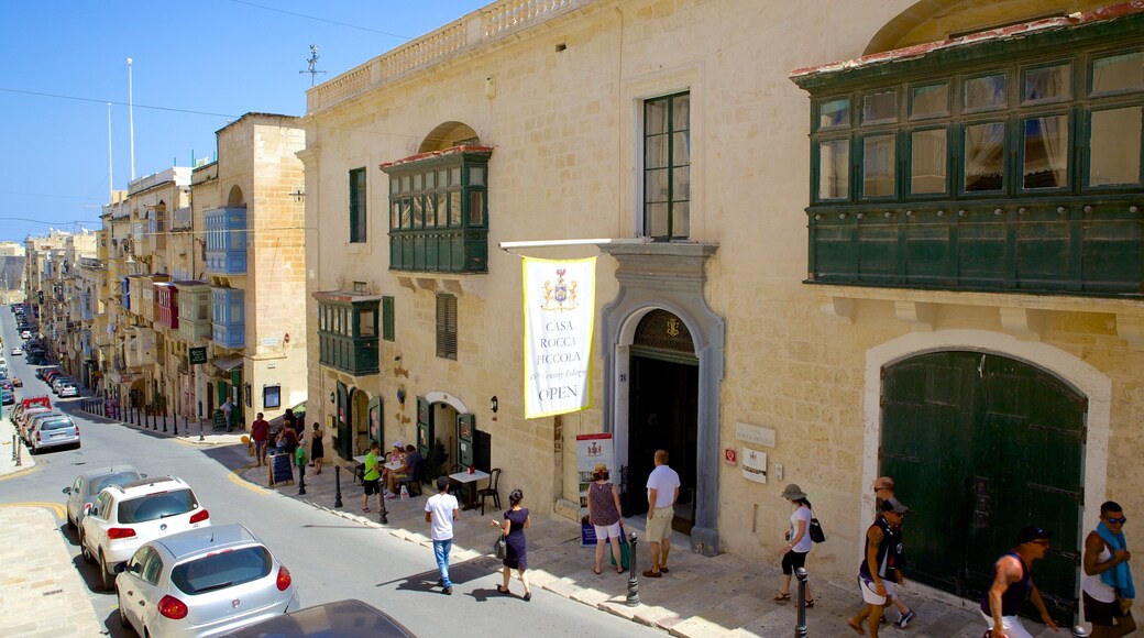 Casa Rocca Piccola which includes a small town or village, heritage architecture and street scenes