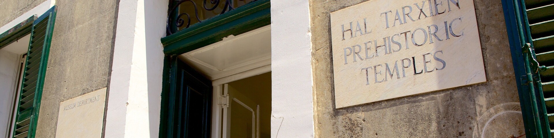 Tarxien Temples featuring religious elements, a temple or place of worship and signage