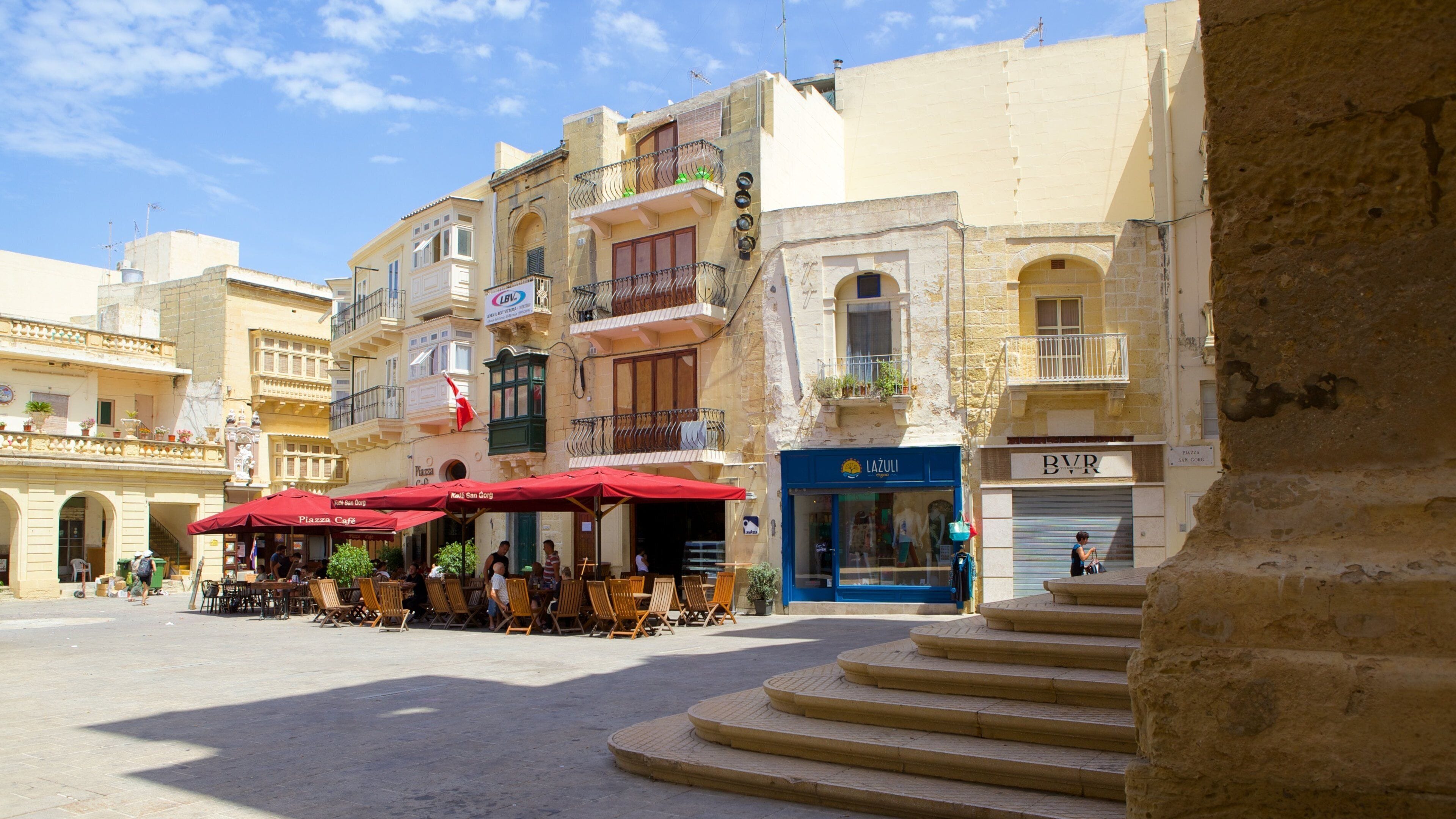 St. George\'s Basilica featuring heritage architecture and a square or plaza