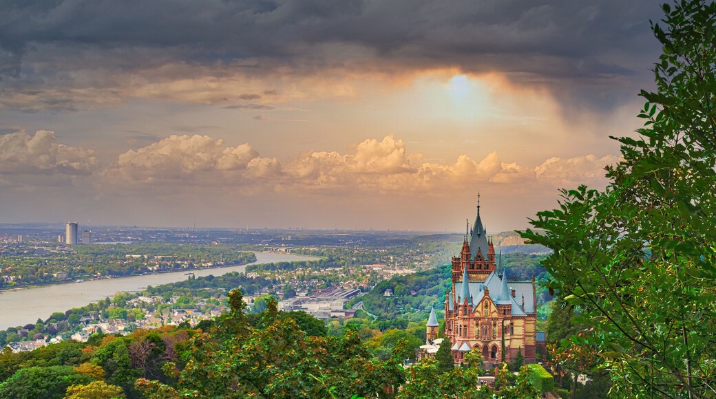 Beautiful cityscape with the castle of Drachenburg on a sunset sky background in Germany