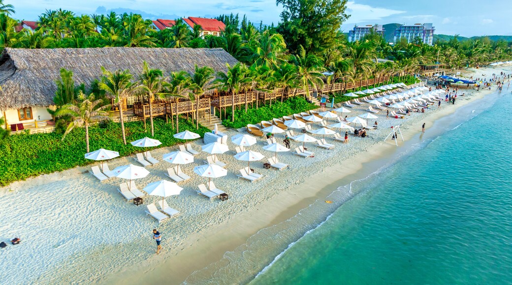Aerial view of tropical Doc Let beach with turquoise waters and white sand in Vietnam