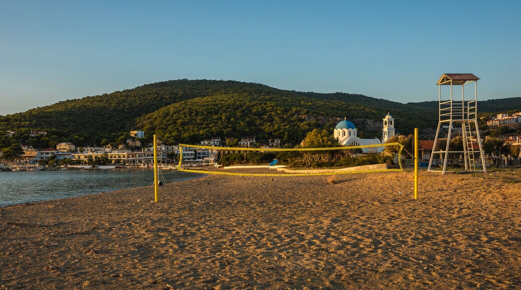Volleyball tower and net on sandy beach