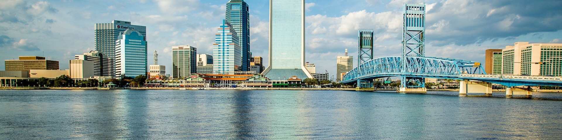 Downtown Jacksonville which includes skyline, a city and a river or creek