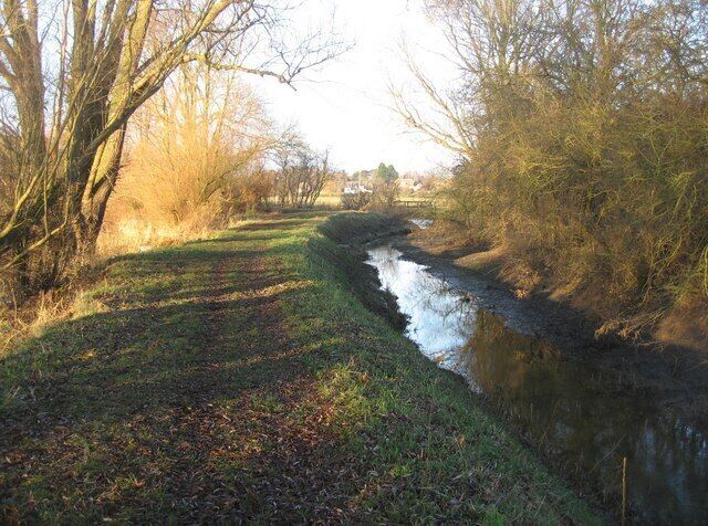 Low water in the ditch Drainage ditch approaching the river Great Ouse.