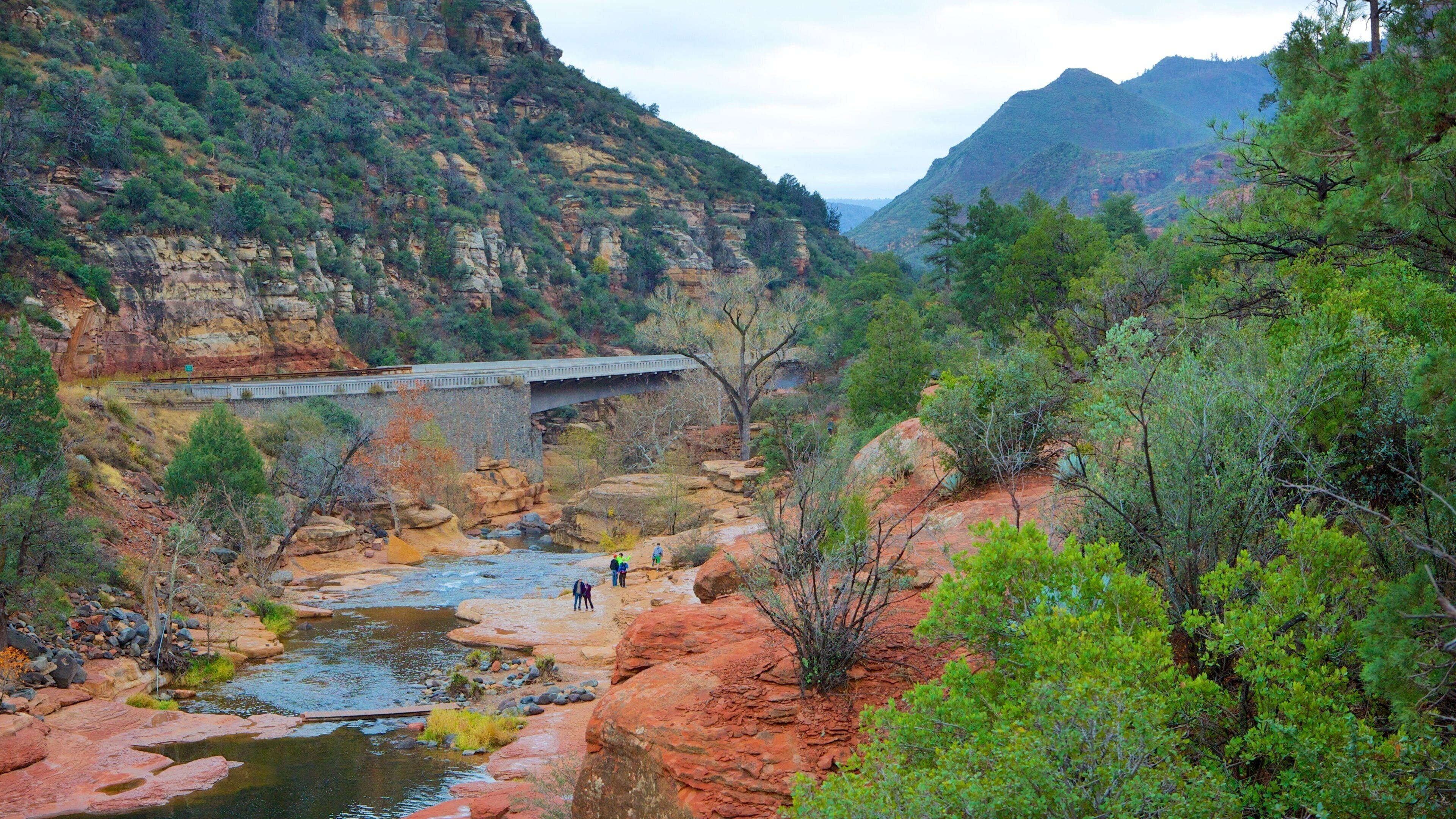 Slide Rock State Park which includes tranquil scenes, a river or creek and mountains