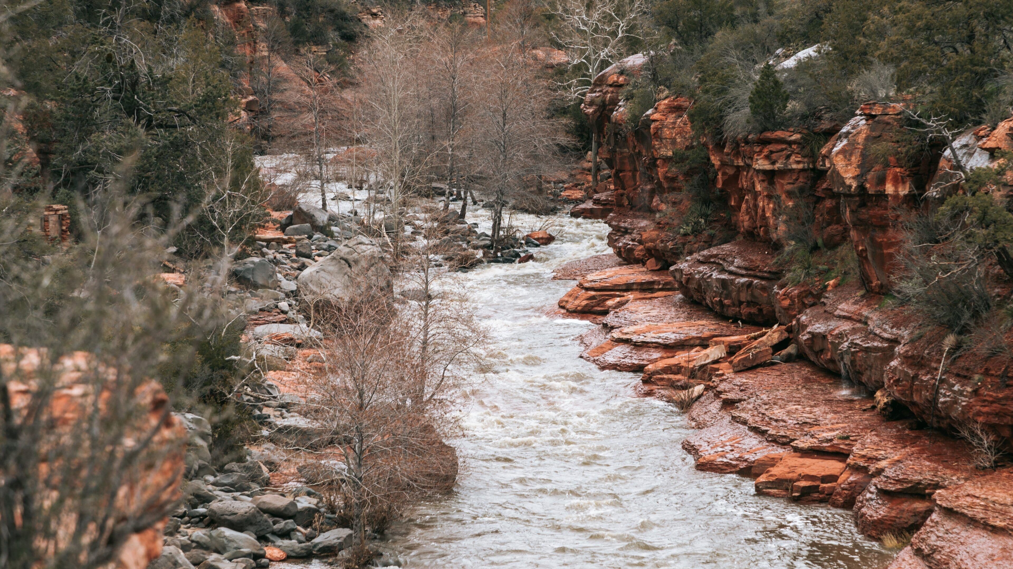 Slide Rock State Park featuring a river or creek and a gorge or canyon