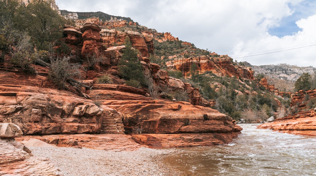 Slide Rock State Park featuring a river or creek and a gorge or canyon