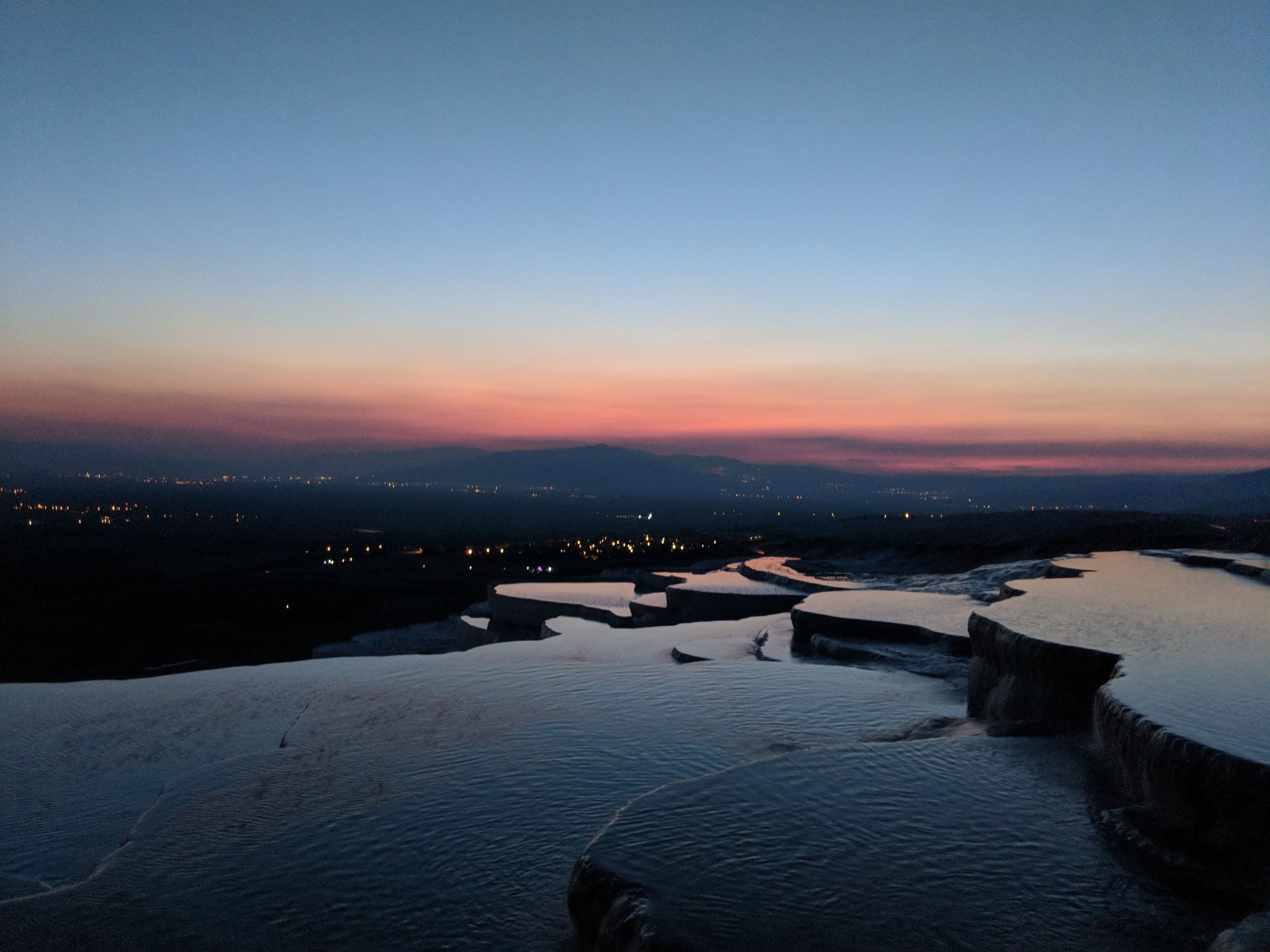 Summer sunset at Travertines. Quick phone photo while waiting for long exposure. Position was north end of grassy area facing west. So relaxing up here... Can't say the same for the walk down in the dark! 