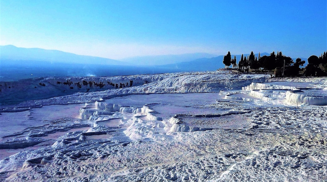 There is quite a surreal feeling to this place. There is a lot of history at #Hierapolis on the same site as #Pamukkale and if you wish to, you can have a walk in the hot springs whilst marvelling at the Travertines made by the carbonate minerals left by the flowing water #Nature
#Mediterranean #Blue #lifeatexpedia #endlesssummer #Unesco #CityIcon #Mountains #BVSBlue #aboveitall #adventure