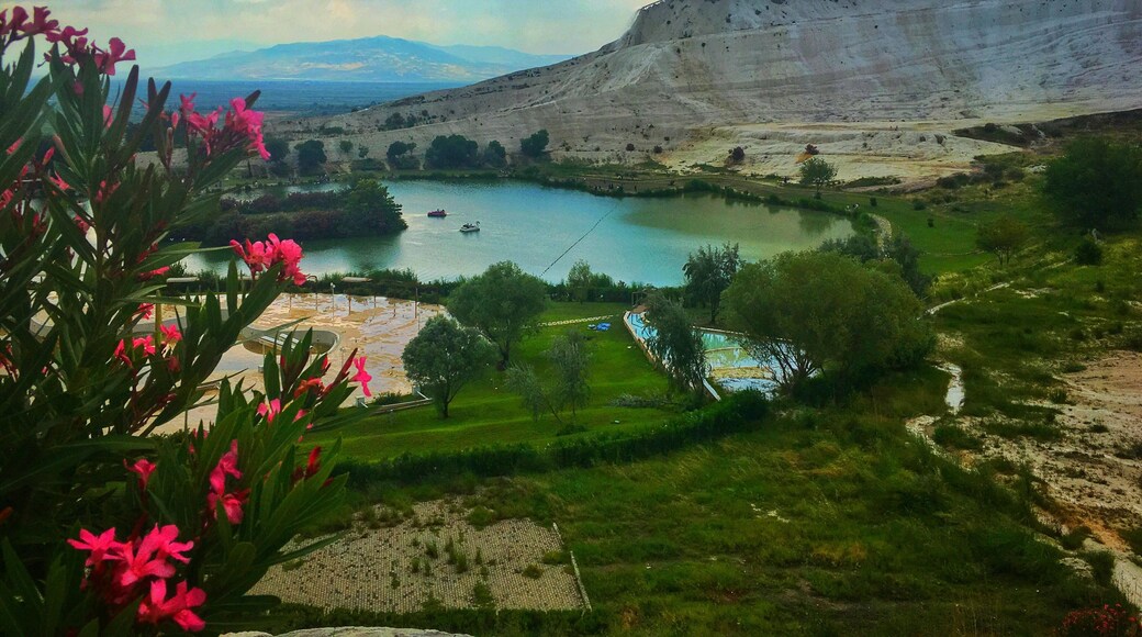 Onsite view of Pamukkale's Travertines. Pamukkale means Cotton Castle. It has white travertine terraces, thermal water & people bathing in calcium pools, and it neighbors Hierapolis the Ancient Roman Spa #pamukkale #pamukkaletravertines #turkey #lifeatexpedia #greatoutdoors #outdoor #trovember