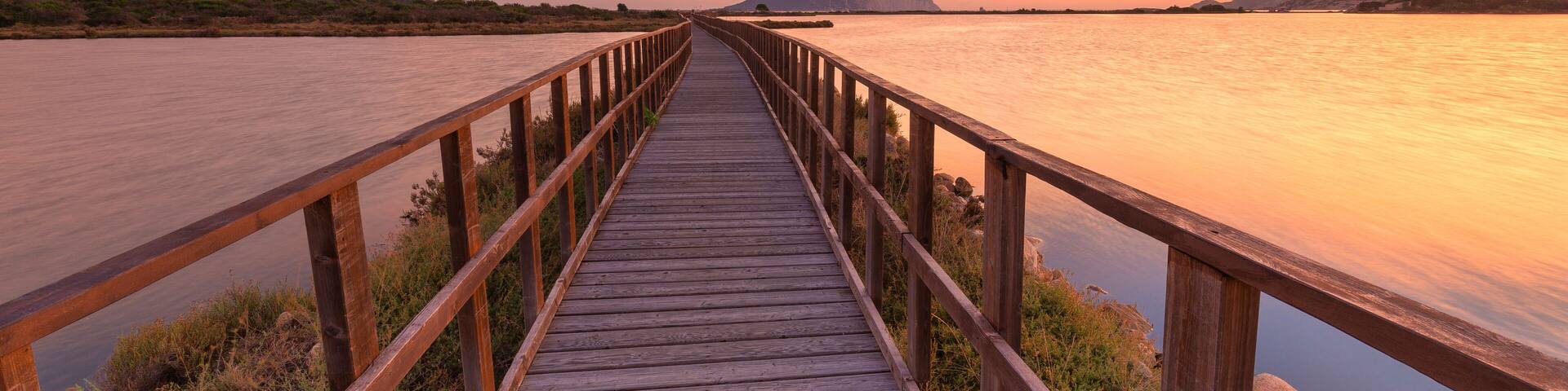 Sunrise from a pedestrian walkway, Porto Taverna, Loiri Porto San Paolo, Olbia Tempio province, Sardinia, Mediterranean