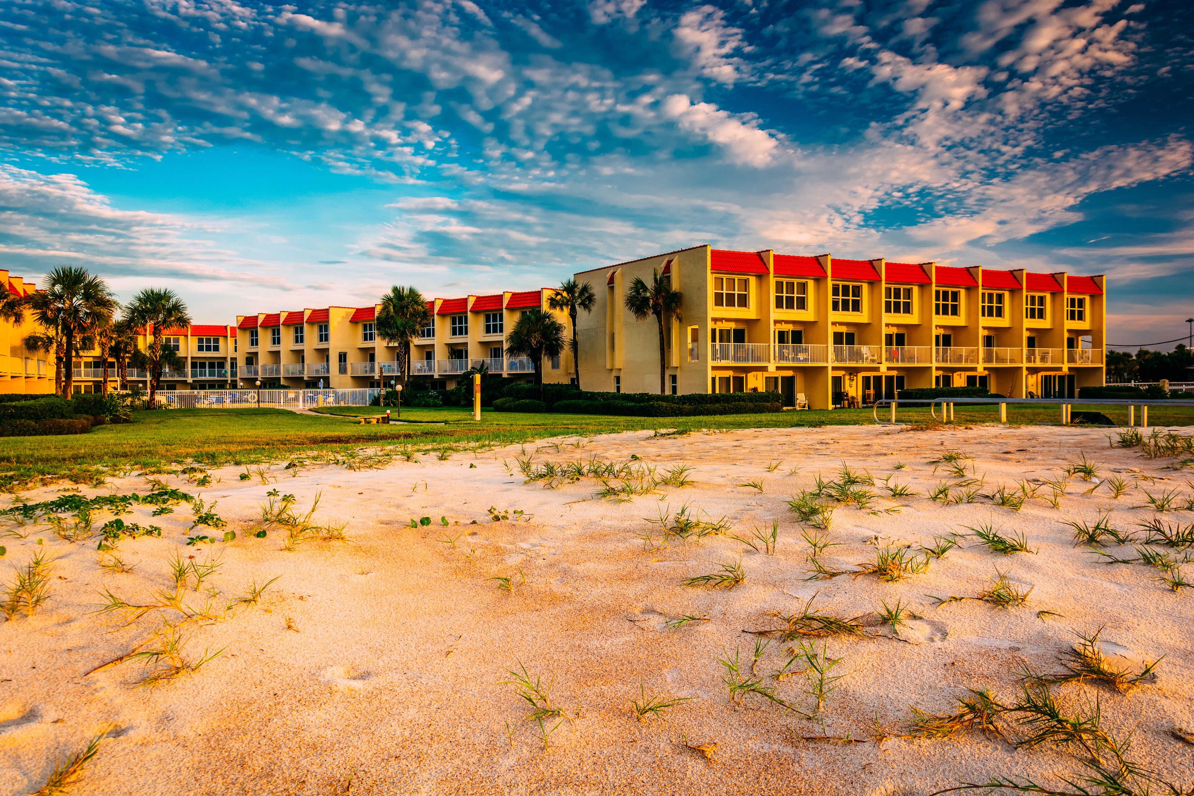 Sand dunes and beachfront hotel at St. Augustine Beach, Florida.; Shutterstock ID 213656296
