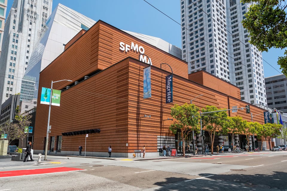 A modern building with a prominent 'SFMO' sign.