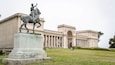 Legion of Honor featuring a garden, a statue or sculpture and heritage architecture