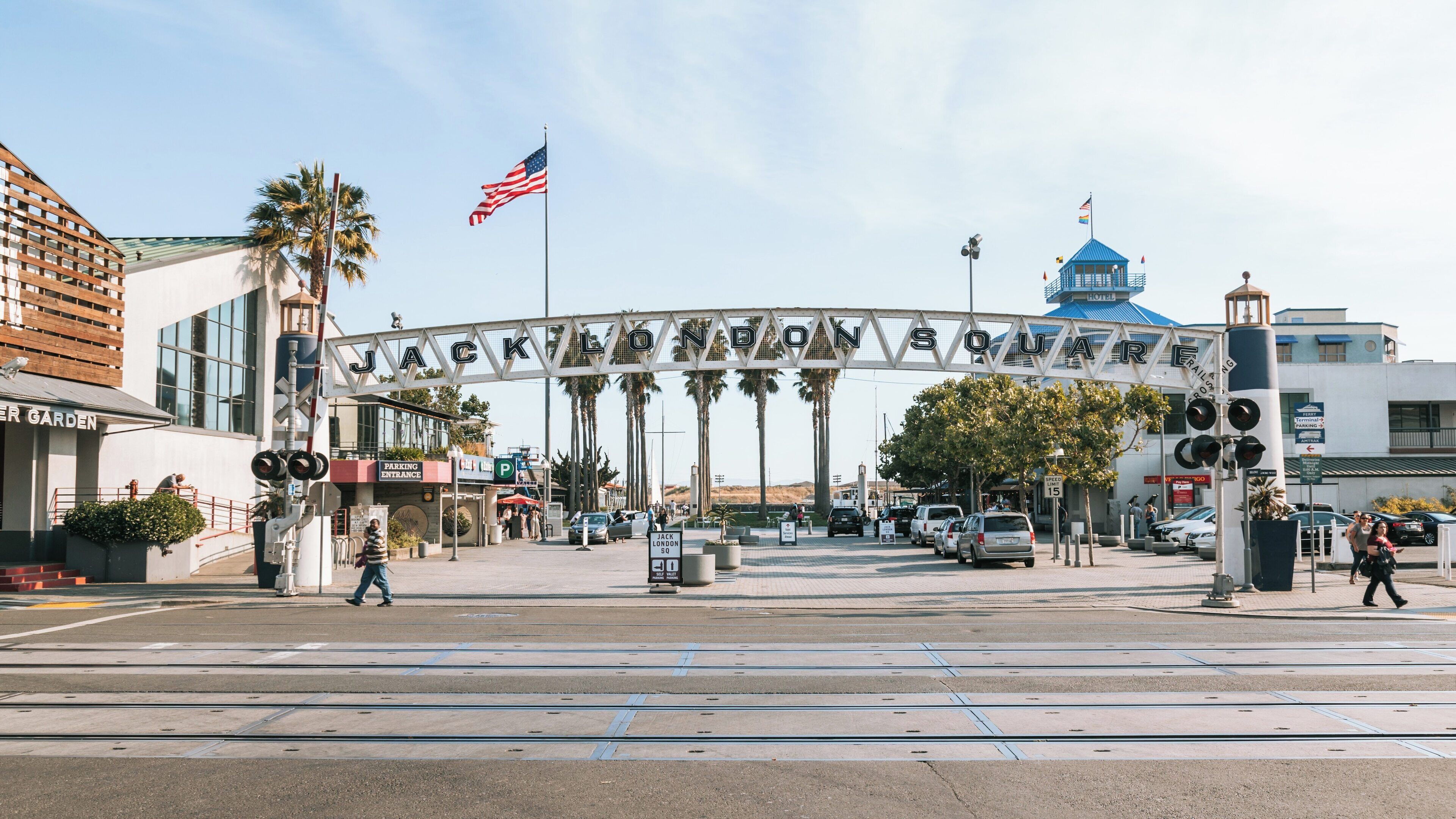Visit Jack London Square in Downtown Oakland, California for scenic views, vibrant activities, and a lively atmosphere