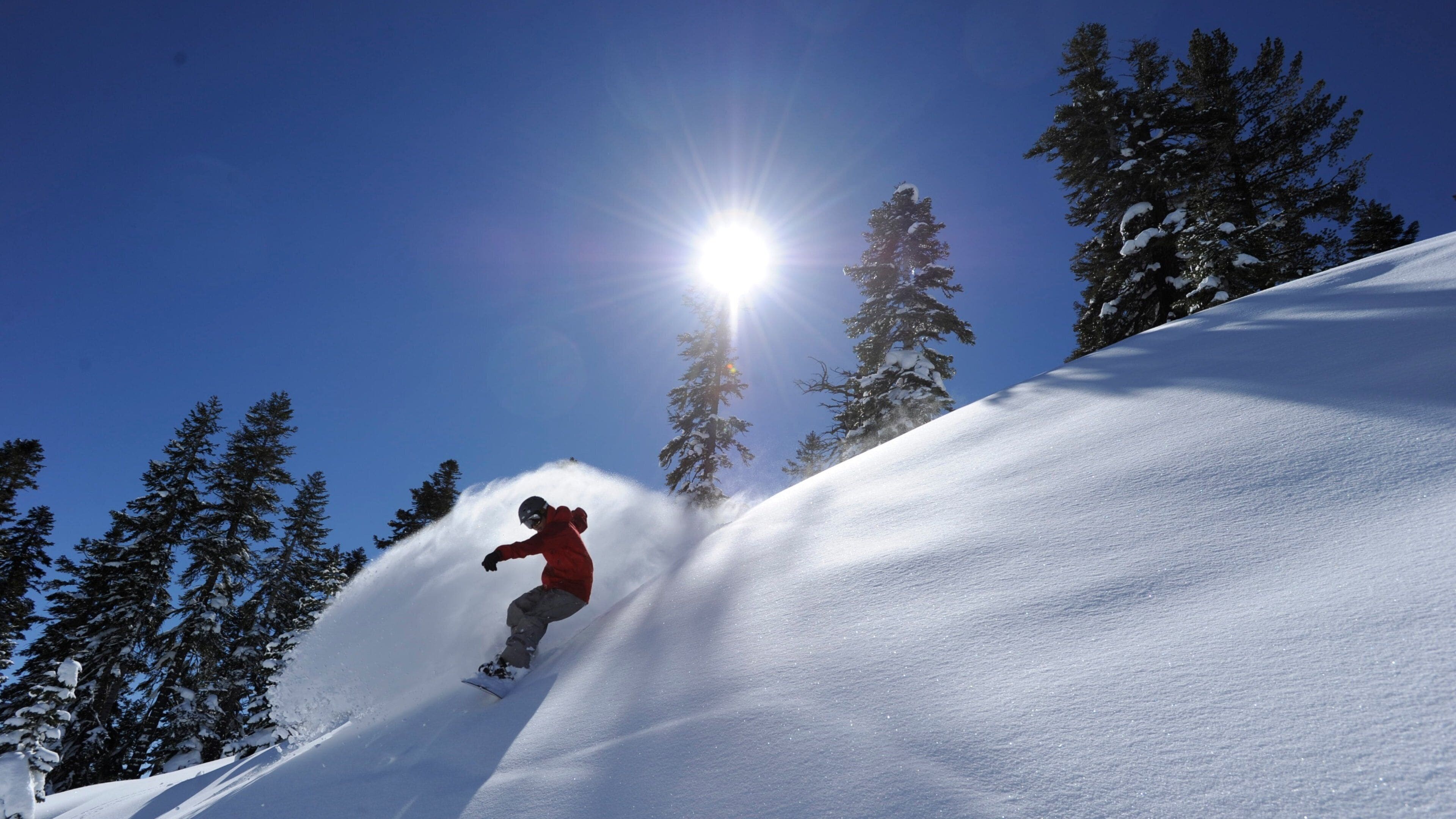 Northstar California Resort featuring snow boarding and snow as well as an individual male