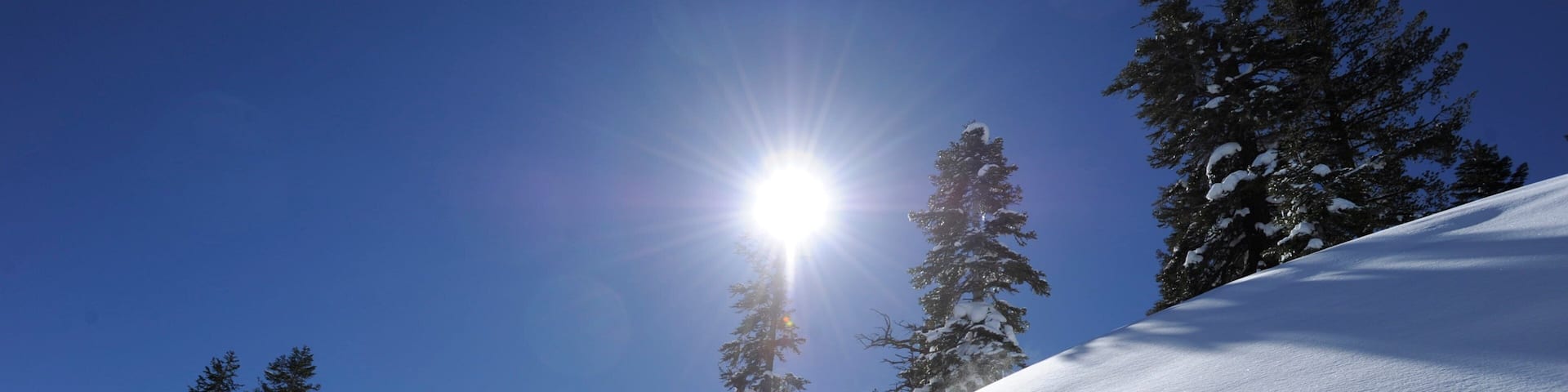 Northstar California Resort featuring snow boarding and snow as well as an individual male