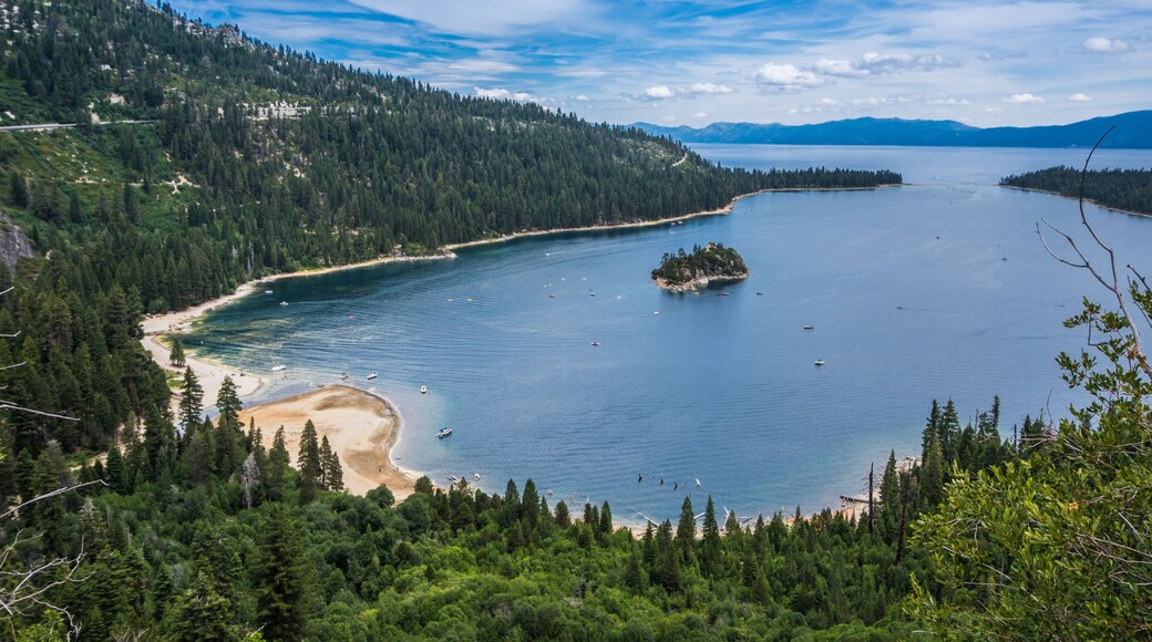 Emerald Bay view with Fannette Island in South Lake Tahoe California in the Sierra Nevada mountains. Sunshine in the summer, boats on the water