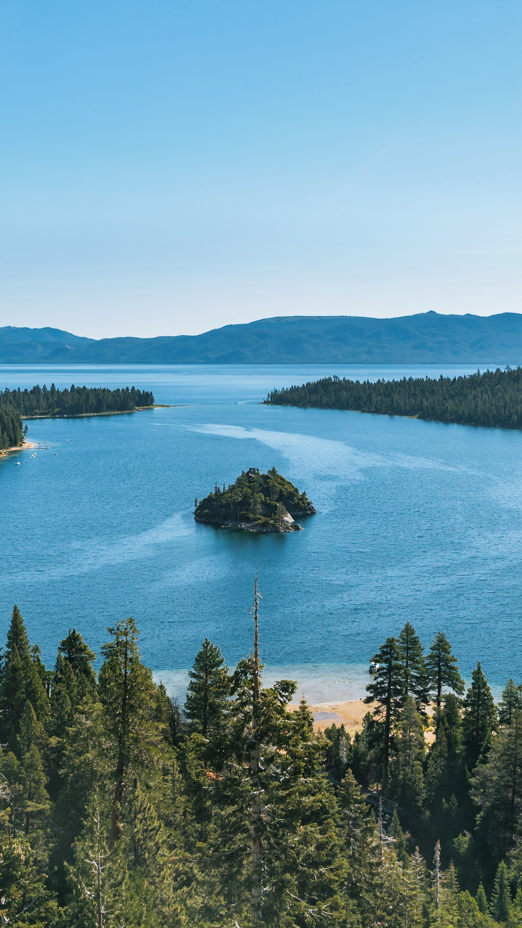 Stunning view of Emerald Bay State Park in Tahoe City, California under clear blue skies showcasing lake and island