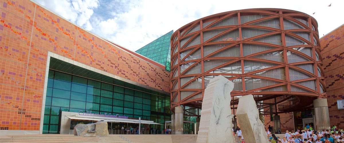 California Science Center showing outdoor art as well as a small group of people