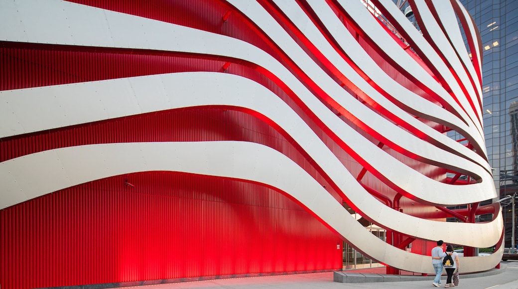 Petersen Automotive Museum showing modern architecture and street scenes as well as a couple