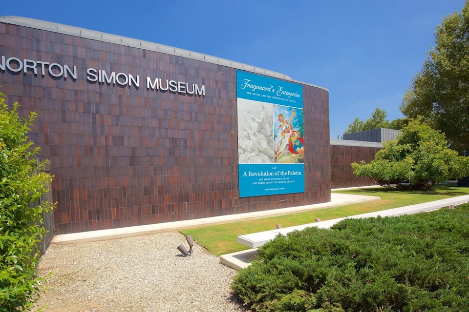 The Norton Simon Museum with a large sign and a poster advertising Fragonard's artwork.