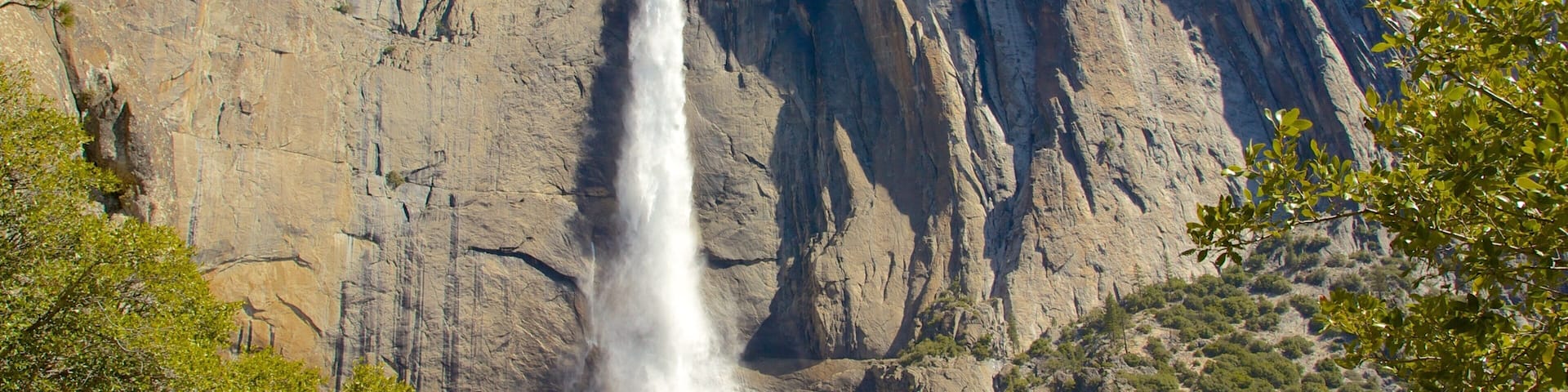 Yosemite Valley featuring a waterfall and mountains
