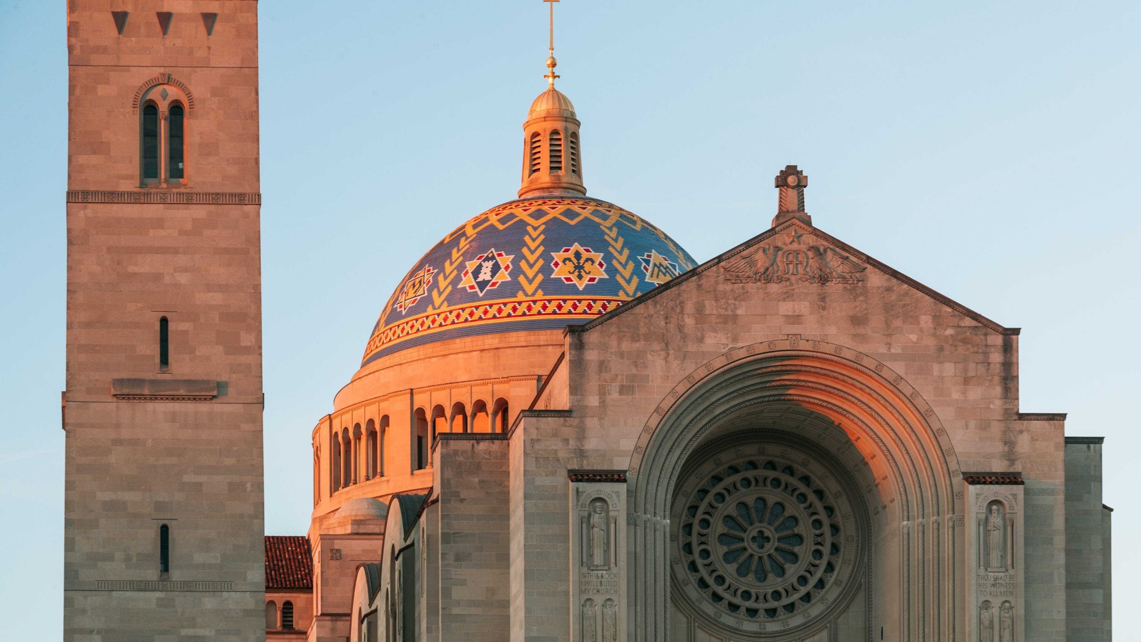 Basilica of the National Shrine of the Immaculate Conception featuring a church or cathedral, heritage architecture and a sunset