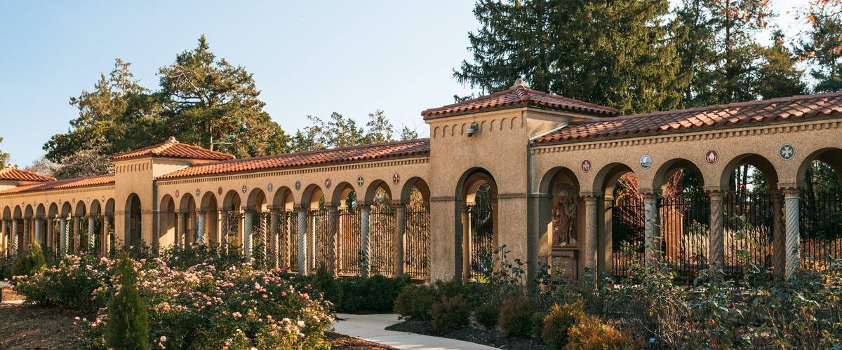 Franciscan Monastery featuring heritage elements, a park and wildflowers