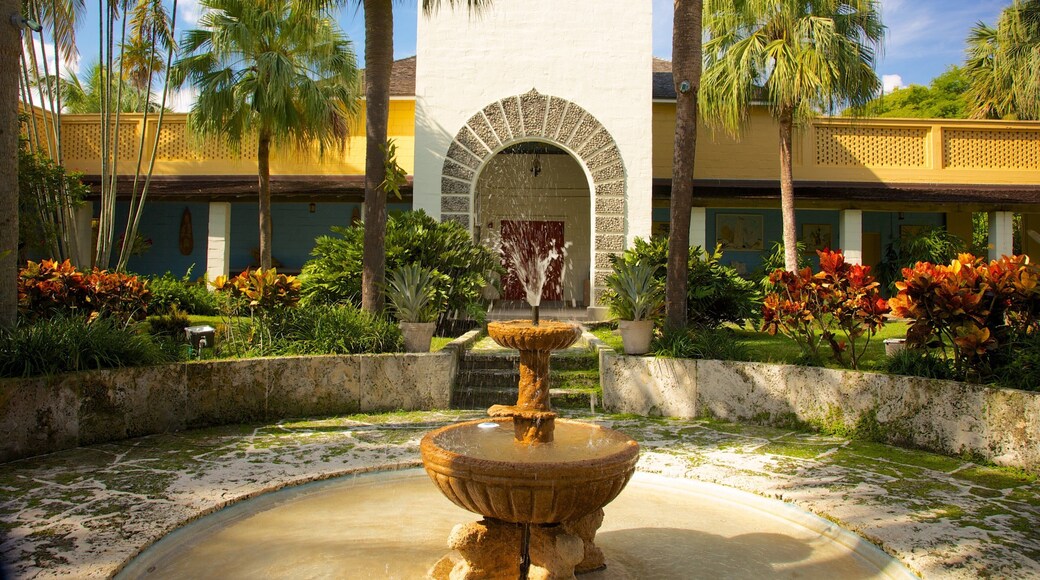 Bonnet House Museum and Gardens showing heritage architecture, a garden and a fountain