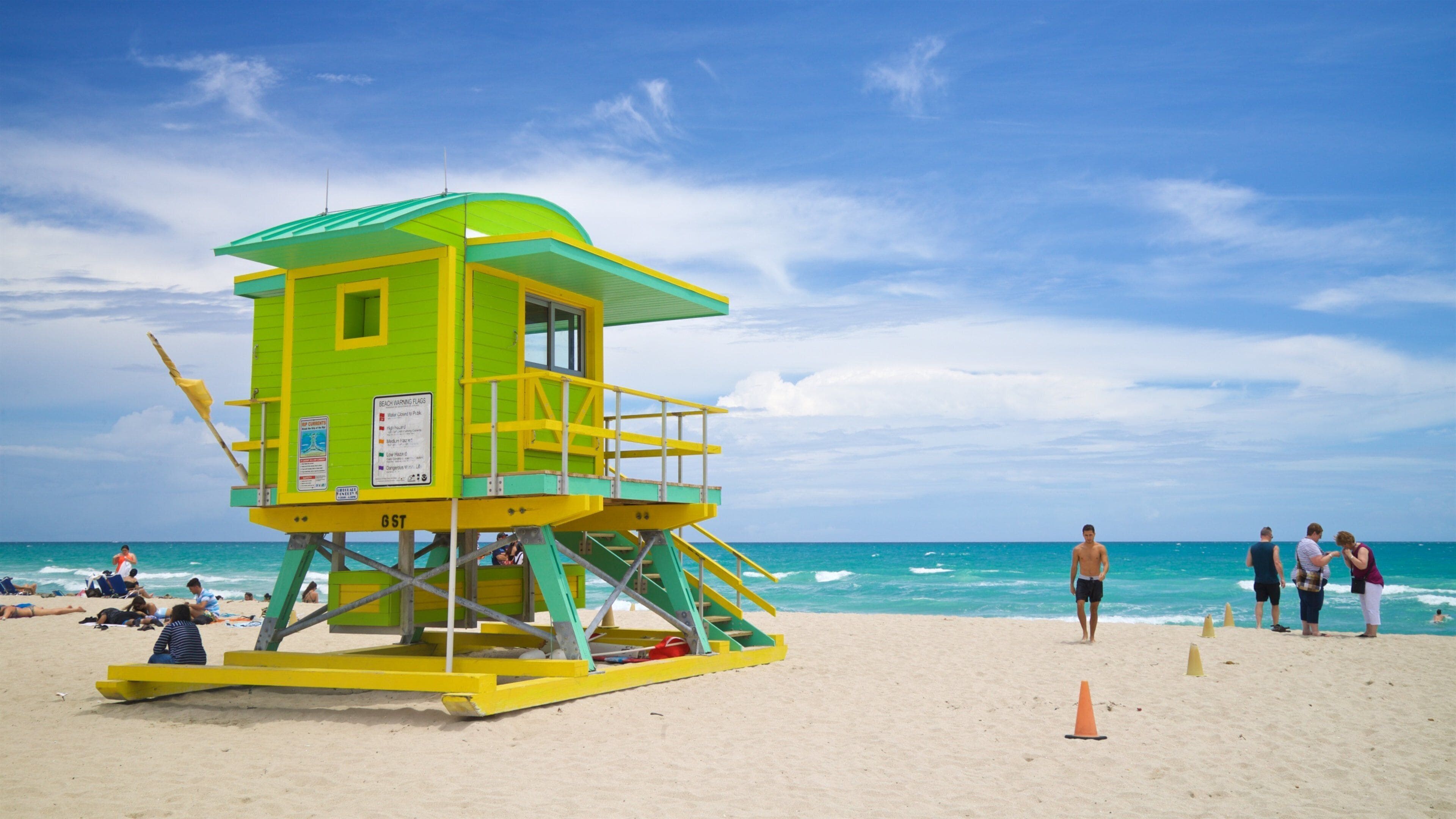 Lummus Park Beach featuring general coastal views and a beach as well as an individual male