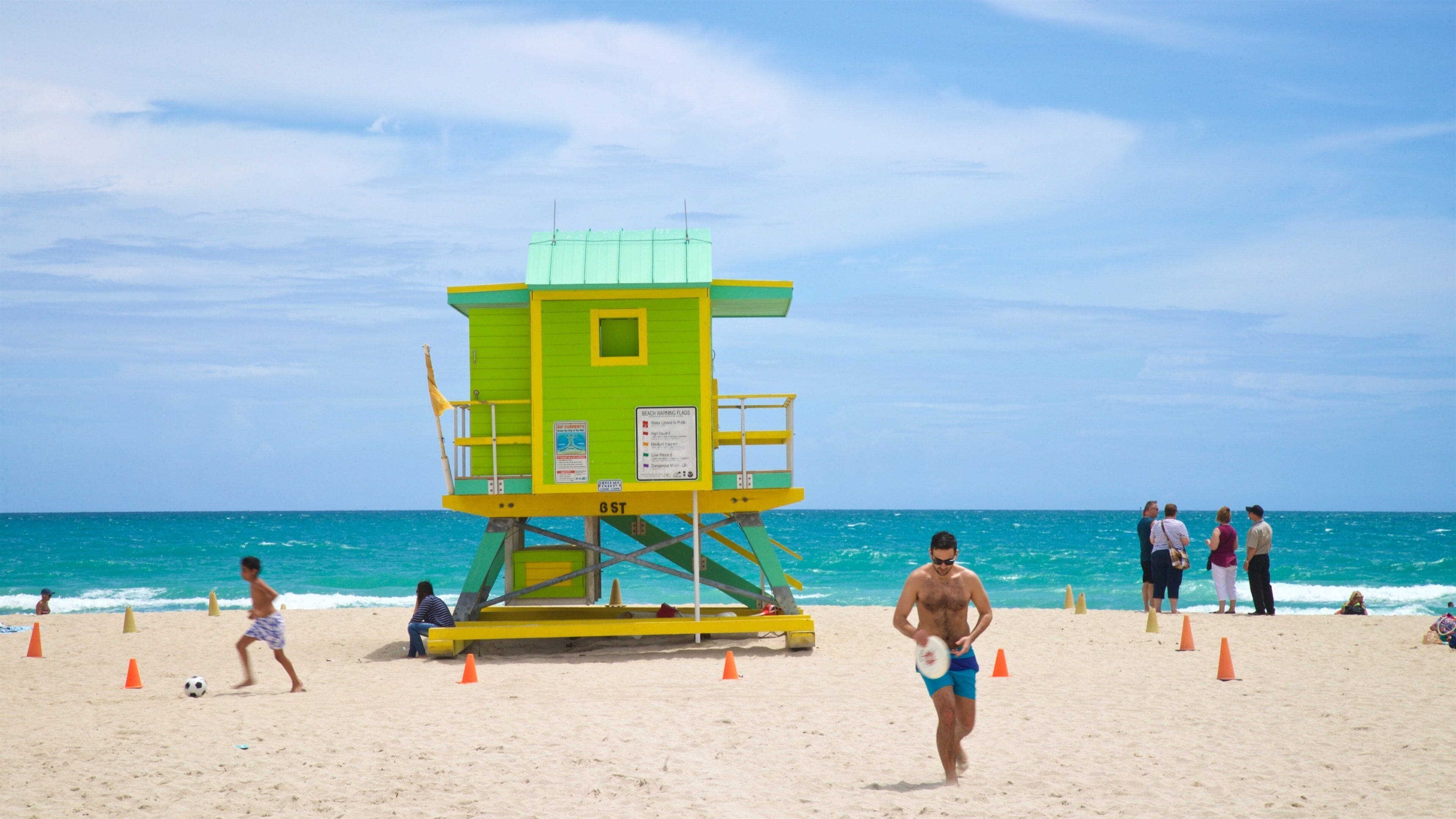 Lummus Park Beach featuring general coastal views and a beach as well as an individual male