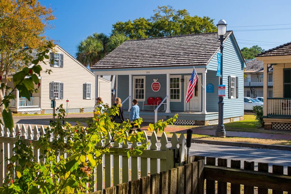 A historic building with a sign reading "Apple Yard Regulatory Office".