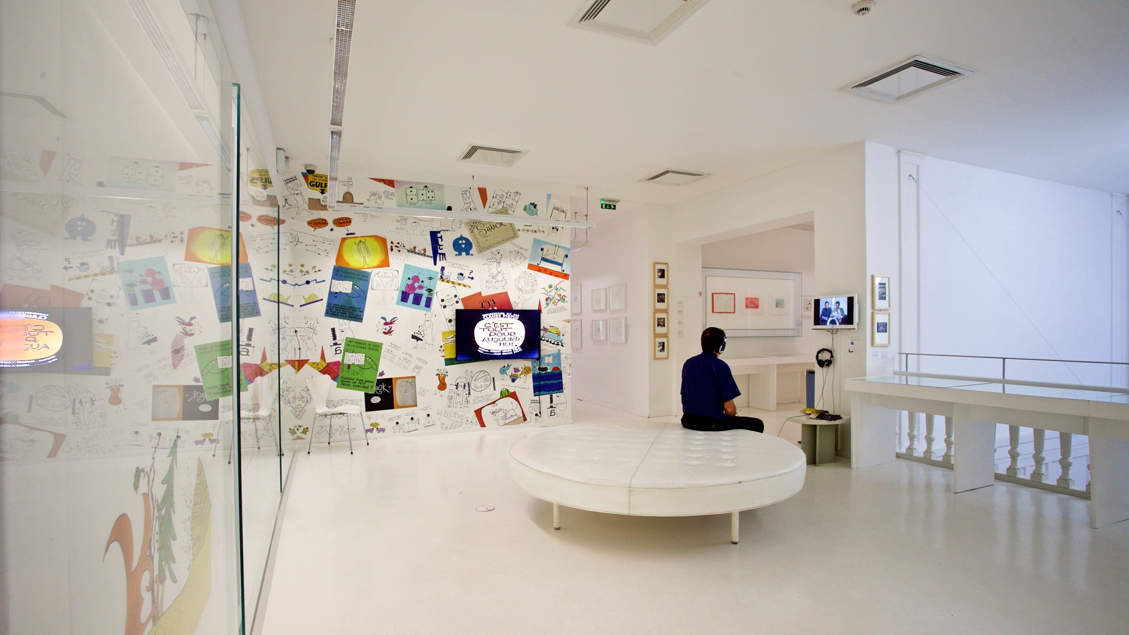 Tomi Ungerer Museum showing interior views and art as well as an individual male