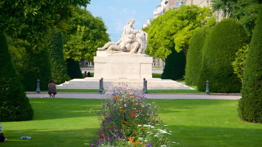 Republic Square featuring flowers and a garden