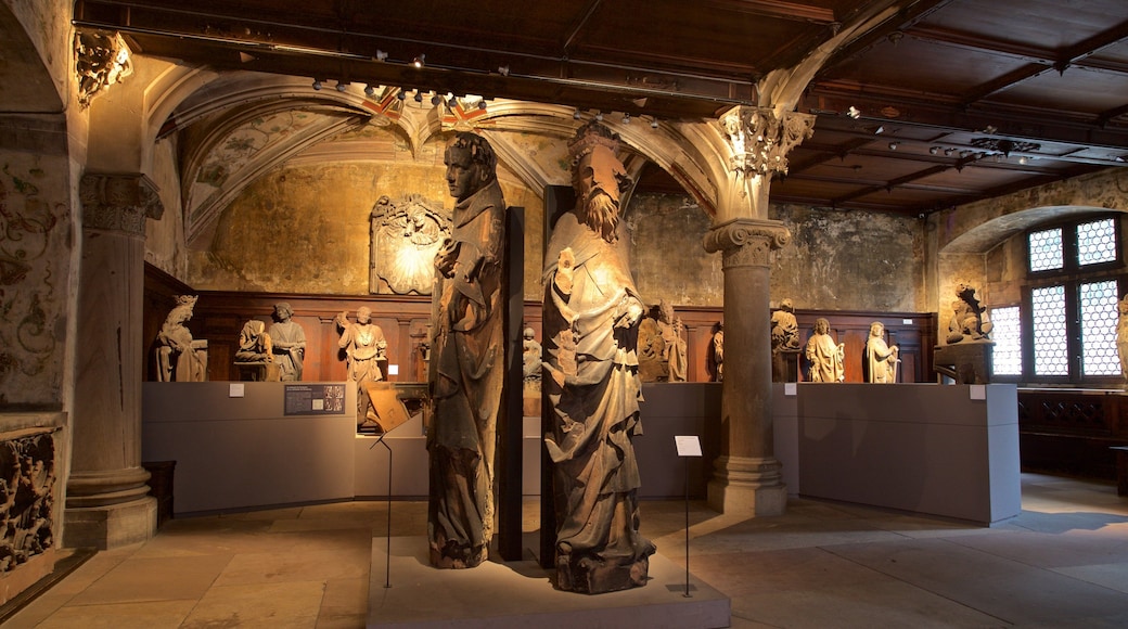 L\'Oeuvre Notre Dame Museum featuring a statue or sculpture, interior views and heritage elements