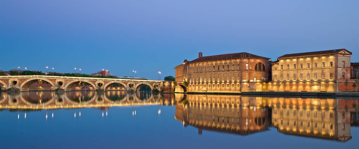 Pont Neuf featuring night scenes, heritage architecture and a lake or waterhole